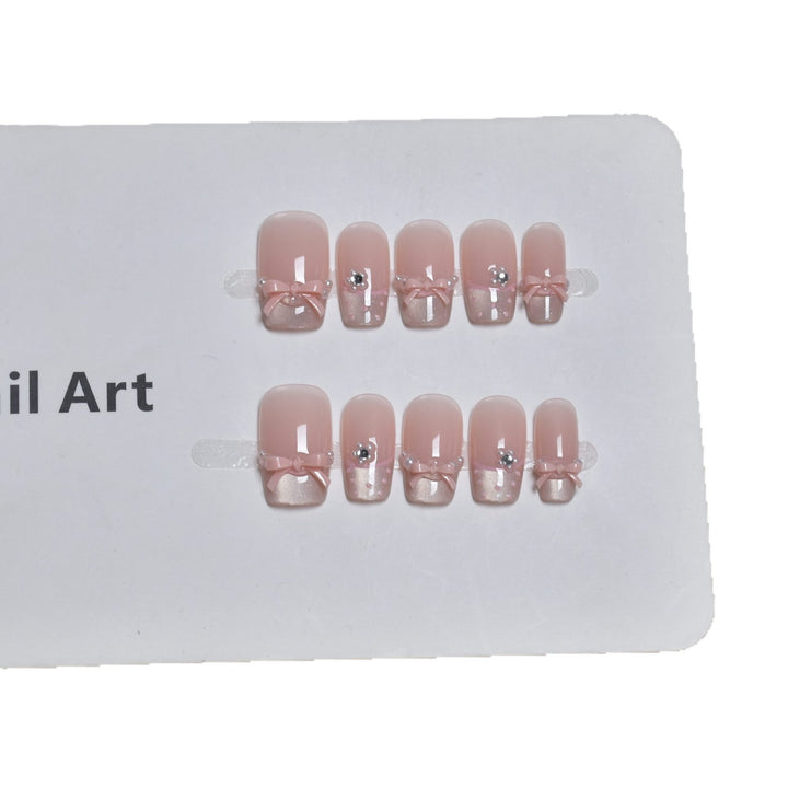 Elegant French Tip Press-On Nail Art with Bow Accents Kalsten