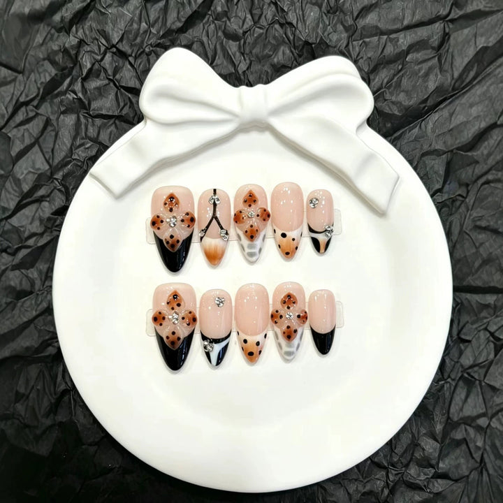 Artistic Press-On Nail Set with Floral and Gem Accents