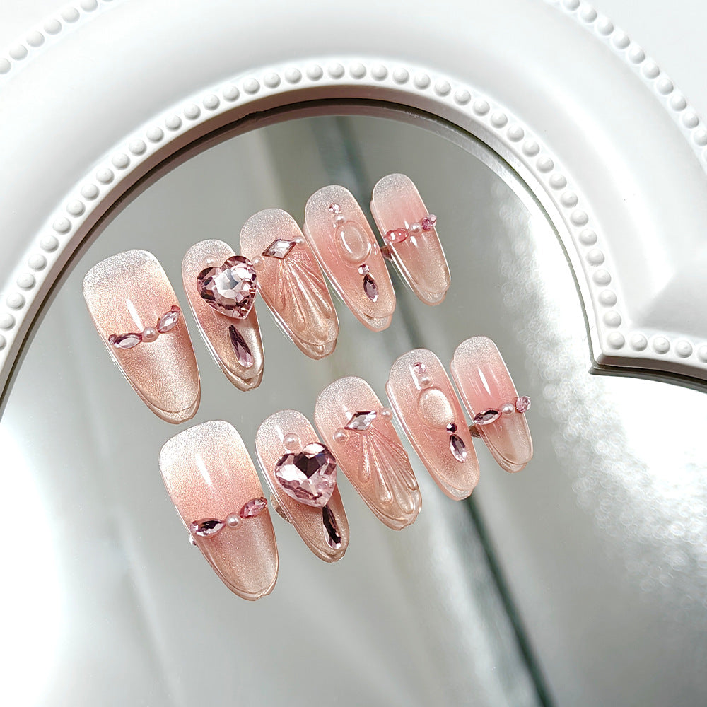 Artificial nails with sparkling heart and rhinestone accents Kalsten