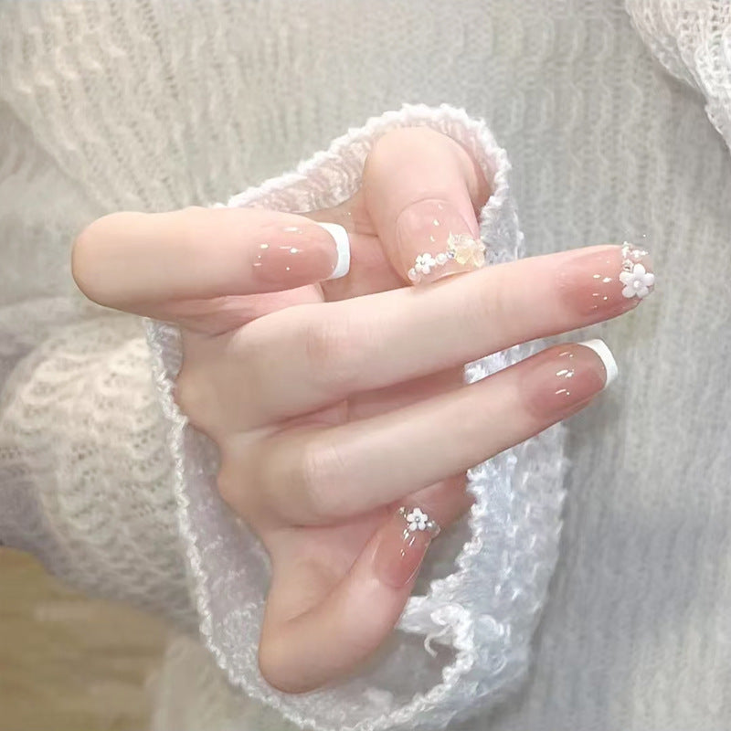 Nail set with elegant flower appliqués and exquisite glitter embellishments Kalsten