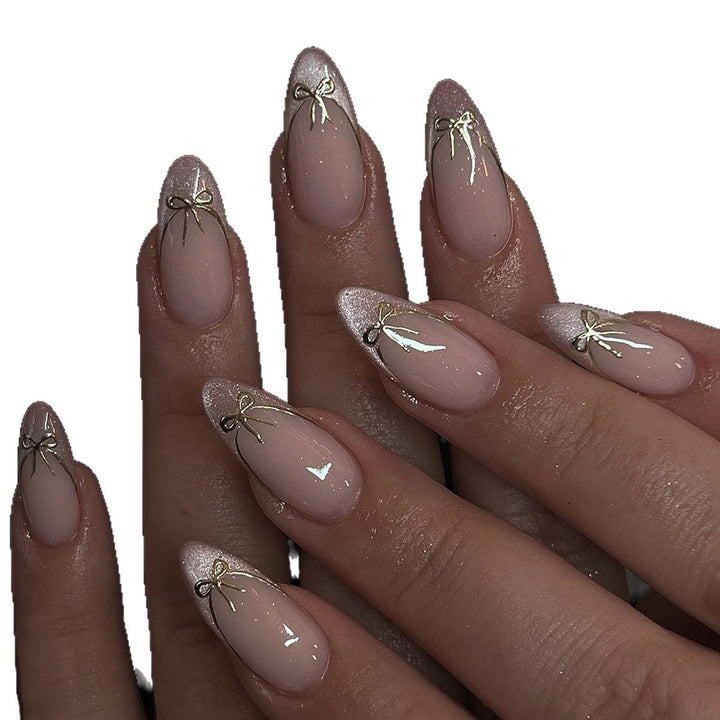 Artificial nail set with shimmering tips and elegant bows Kalsten