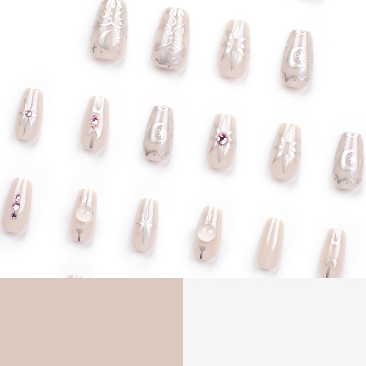 Artificial nail art with elegant rhinestone and glitter effects Kalsten