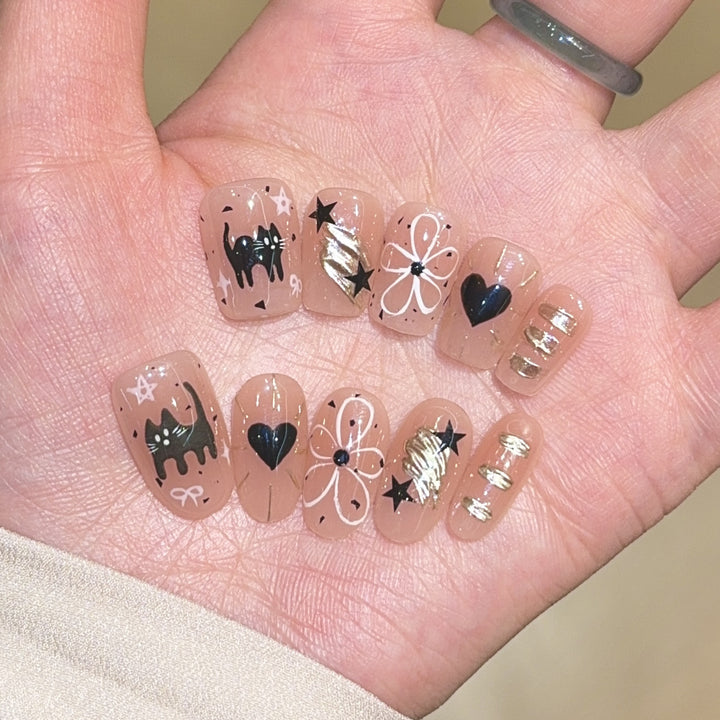 Artificial nails with unique cat and star design Kalsten