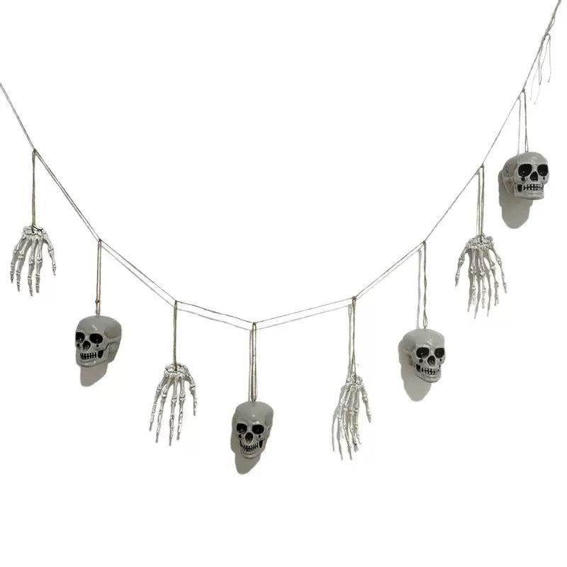 Decorative garland with skeleton hands