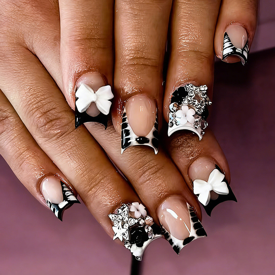 Elegant artificial nails with detailed embellishments Kalsten
