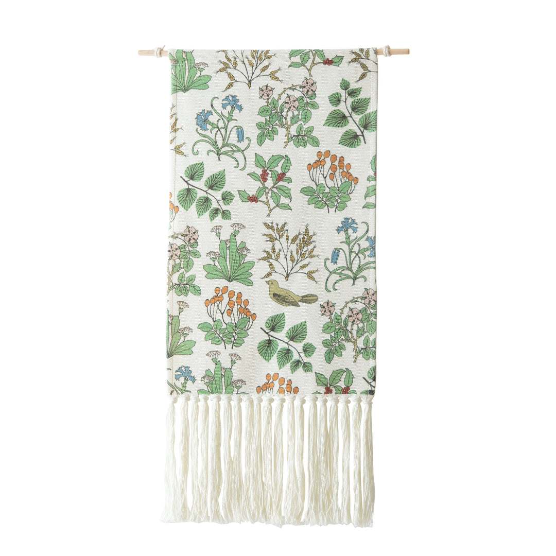 Woven wall tapestry with hydrangea pattern and long fringes
