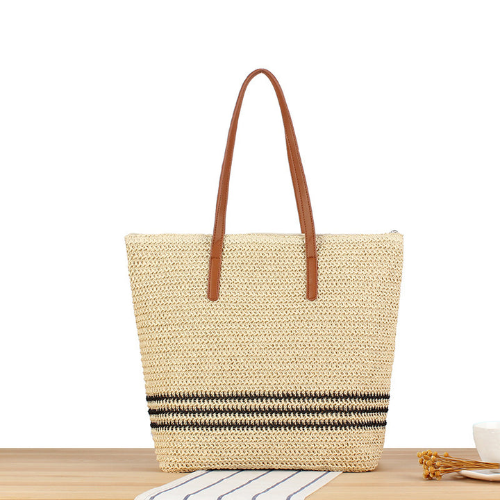 Stylish beach bag made of natural weave with leather handles Kalsten