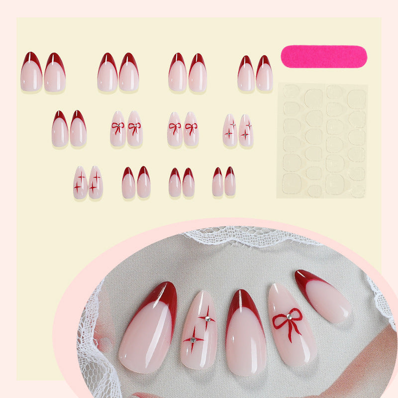 Creative artificial nail set with elegant bow and gradient design Kalsten