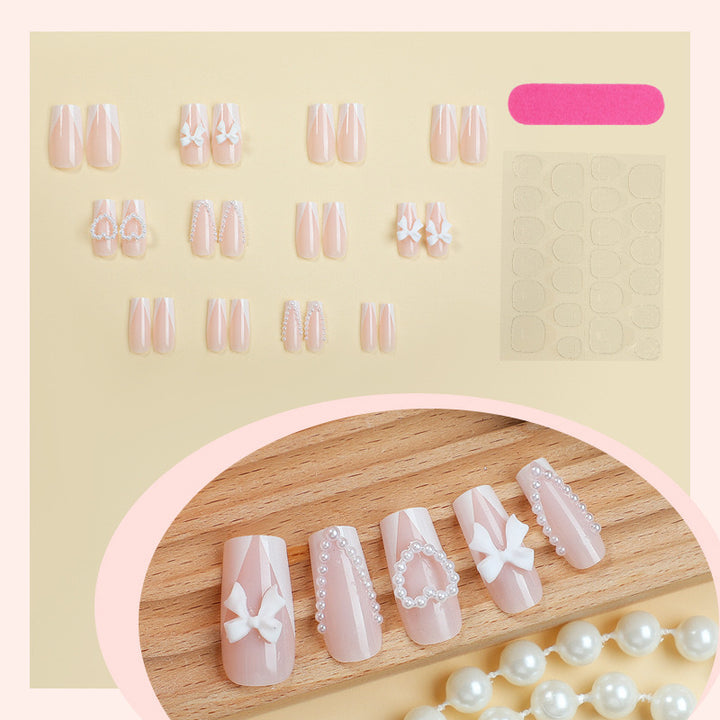 Artificial nail set with filigree hearts and bow decorations Kalsten