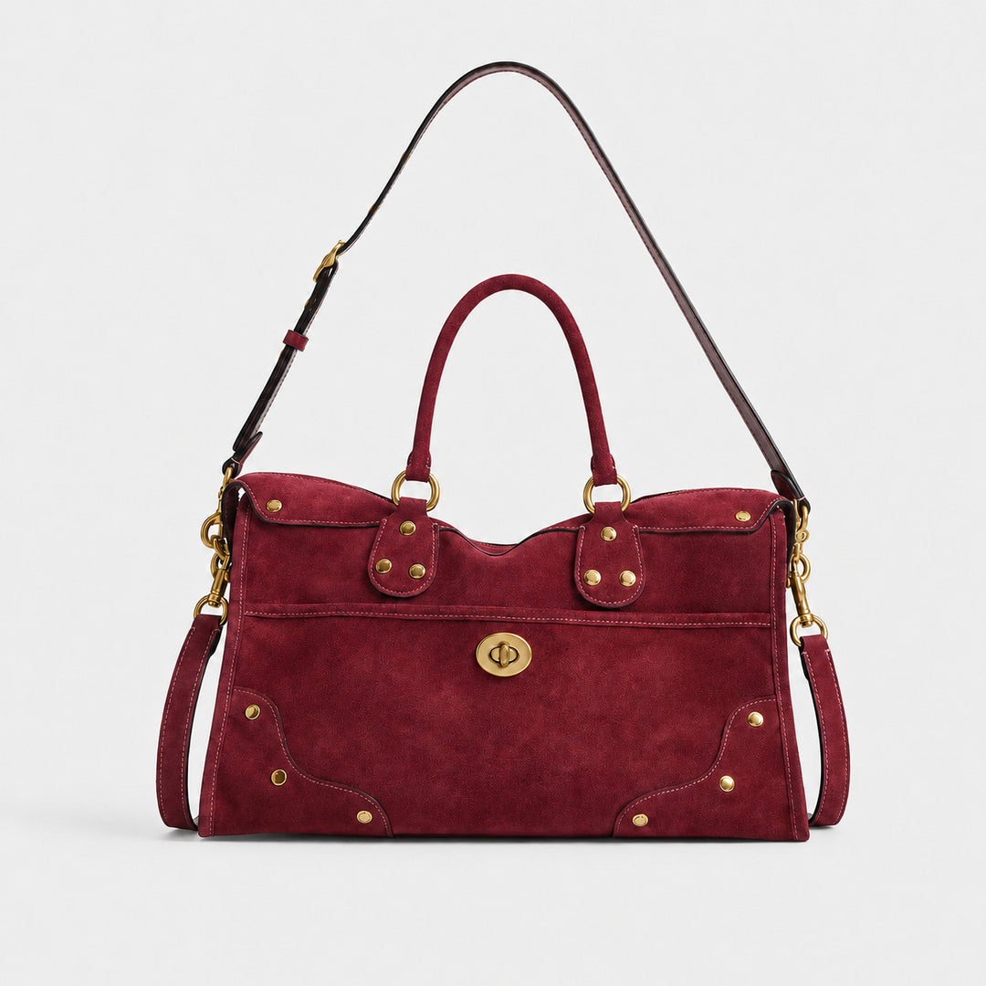 Elegant Suede Handbag with Brass Accents