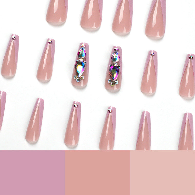 Artful nail extensions with rhinestone and flower accents Kalsten