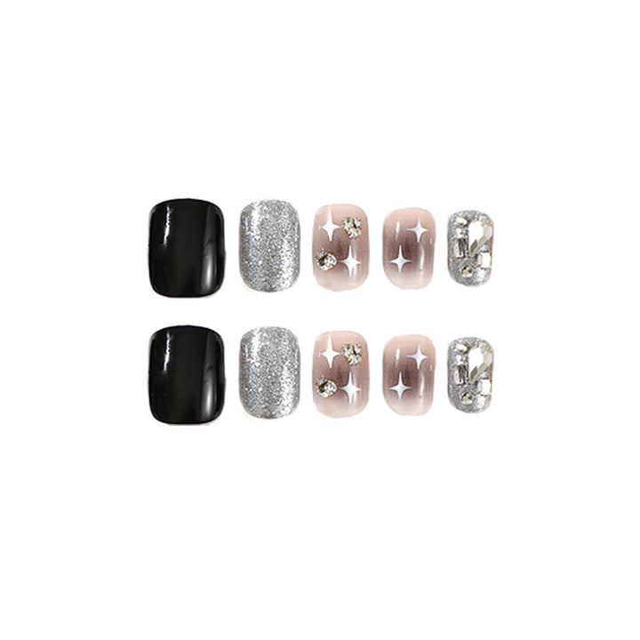 Elegant Nail Art with Glitter and Star Motifs Kalsten