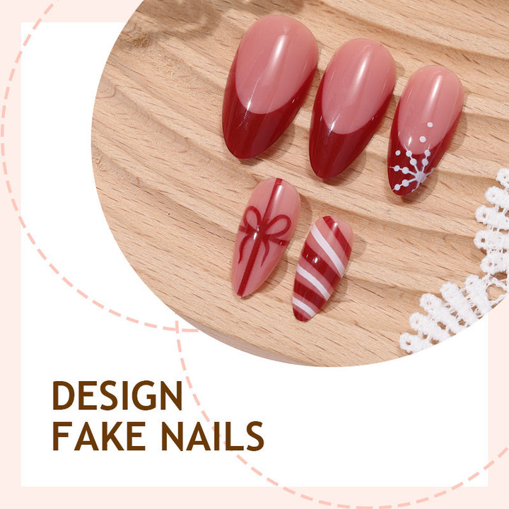Artificial nail set with festive bow and stripe designs Kalsten