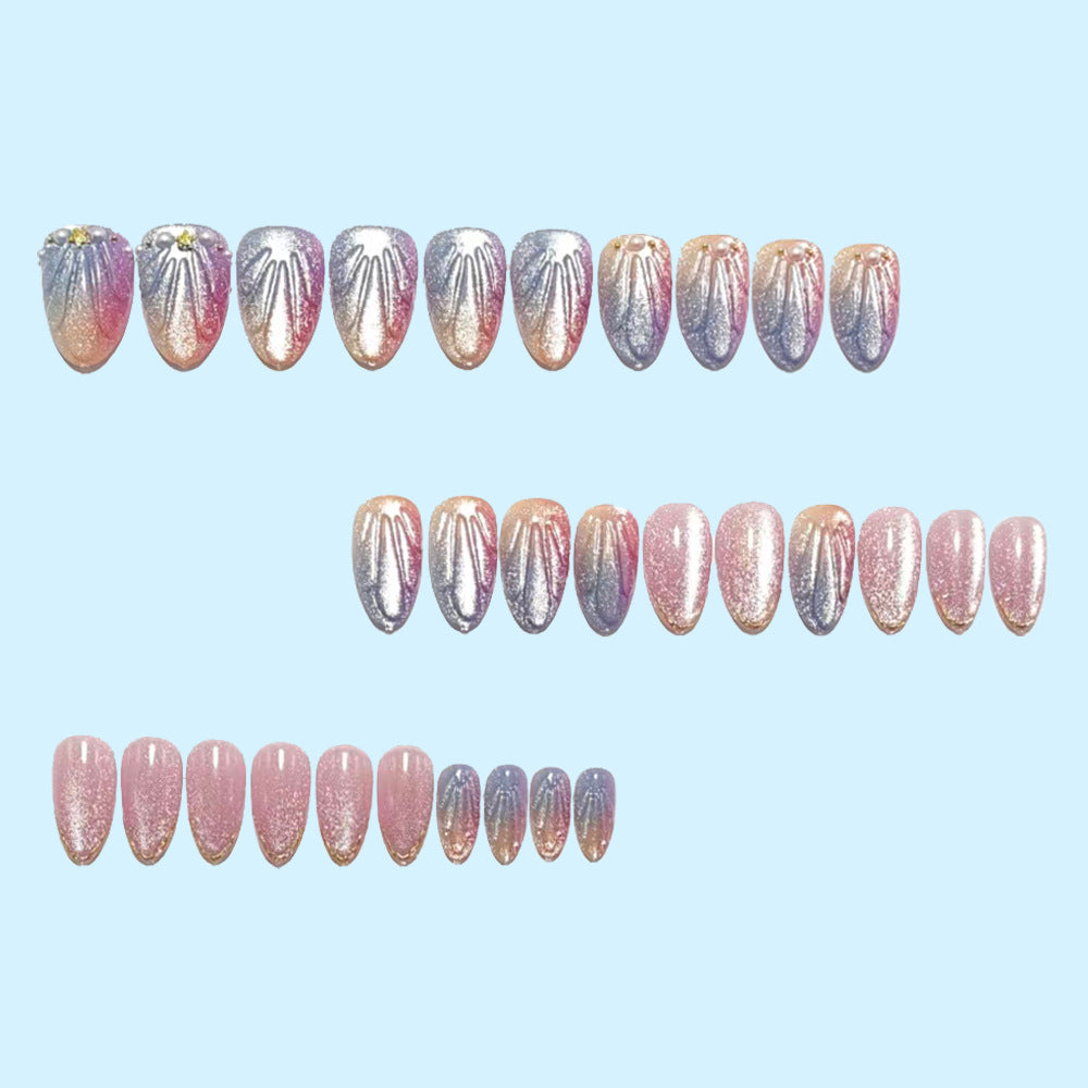 Artificial nails in elegant ombre design with glitter embellishments Kalsten