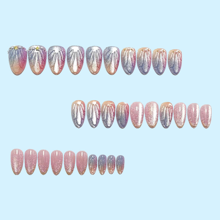 Artificial nails in elegant ombre design with glitter embellishments Kalsten