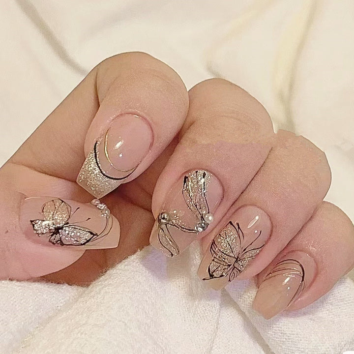 Artificial nails with filigree butterfly design Kalsten