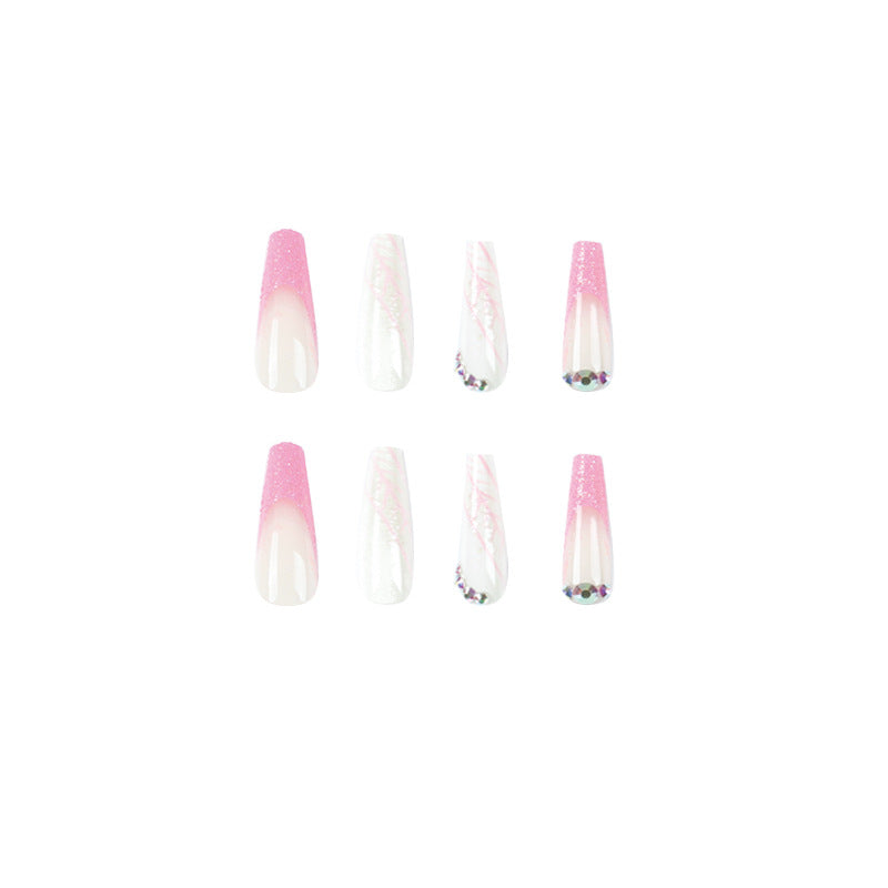 Artistic stiletto nails with glitter and snowflake design Kalsten
