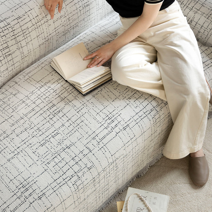 Universal sofa throw made of woven cotton blend with fringes and gentle upholstery cover Kalsten
