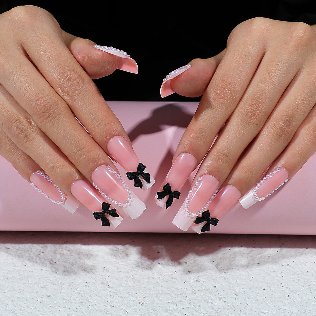 Artificial nail set with elegant rhinestone and bow decorations Kalsten