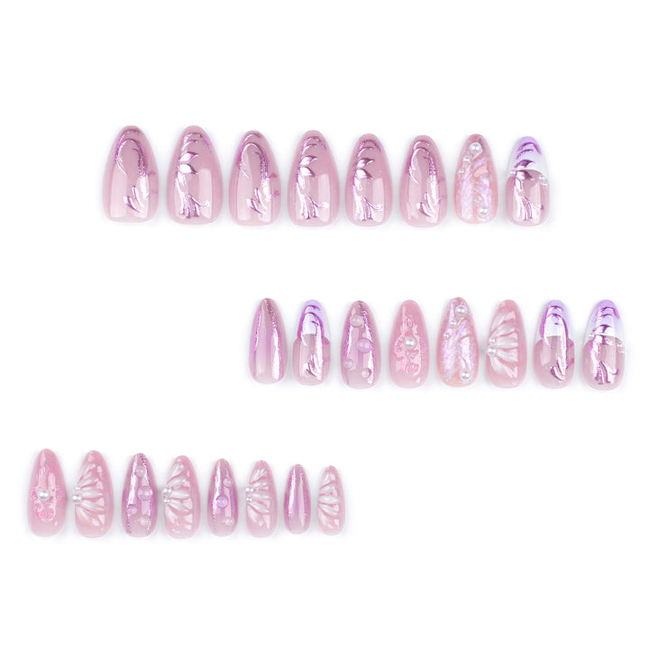 Artificial nail extensions with delicate floral designs and glitter accents Kalsten