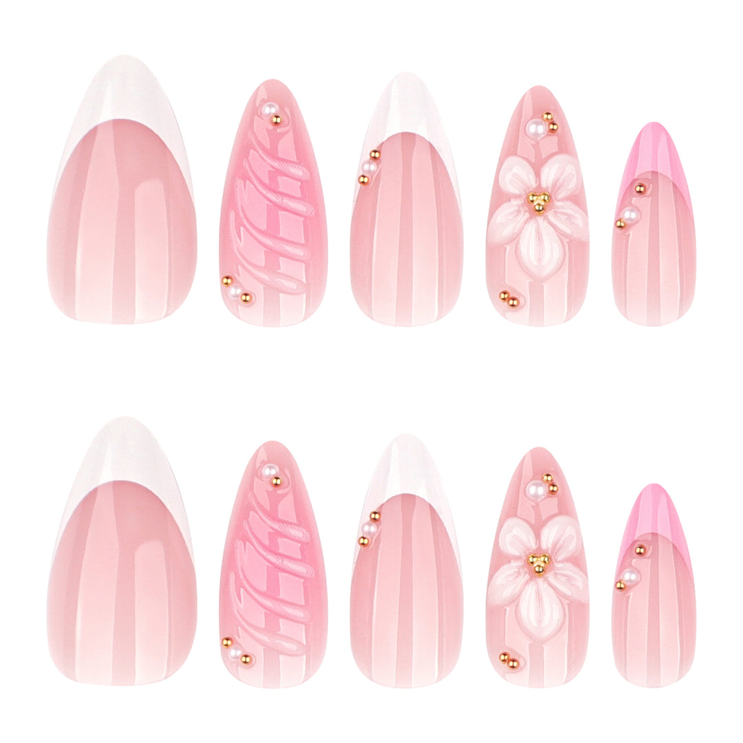 Artificial nail art with floral design and glitter accents Kalsten