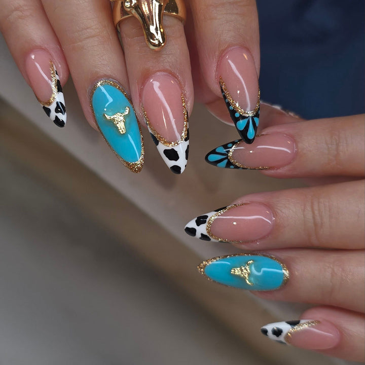Artistic Stiletto Nail Art Extensions with Cow Print and Gold Accents Kalsten