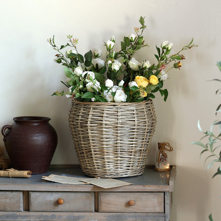 Stylish laundry basket made of braided natural material Kalsten
