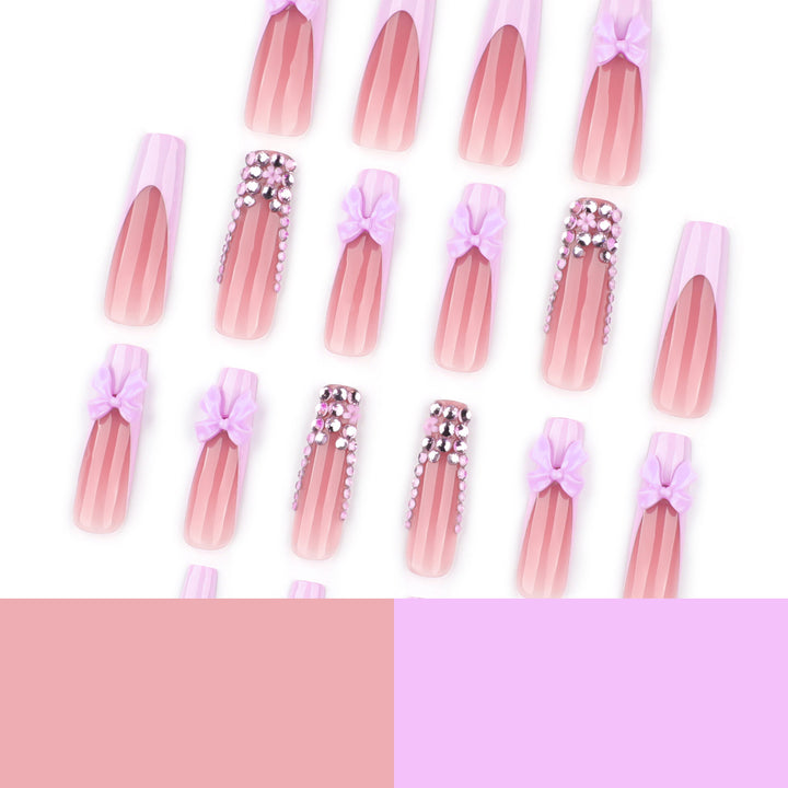 Artful Nail Art with Rhinestone Accents and Bows Kalsten