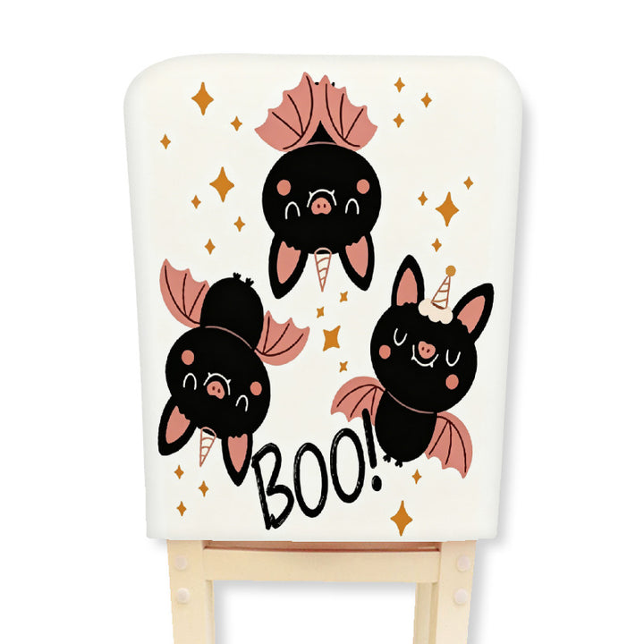 Padded chair back cover with Halloween illustration and spider web design
