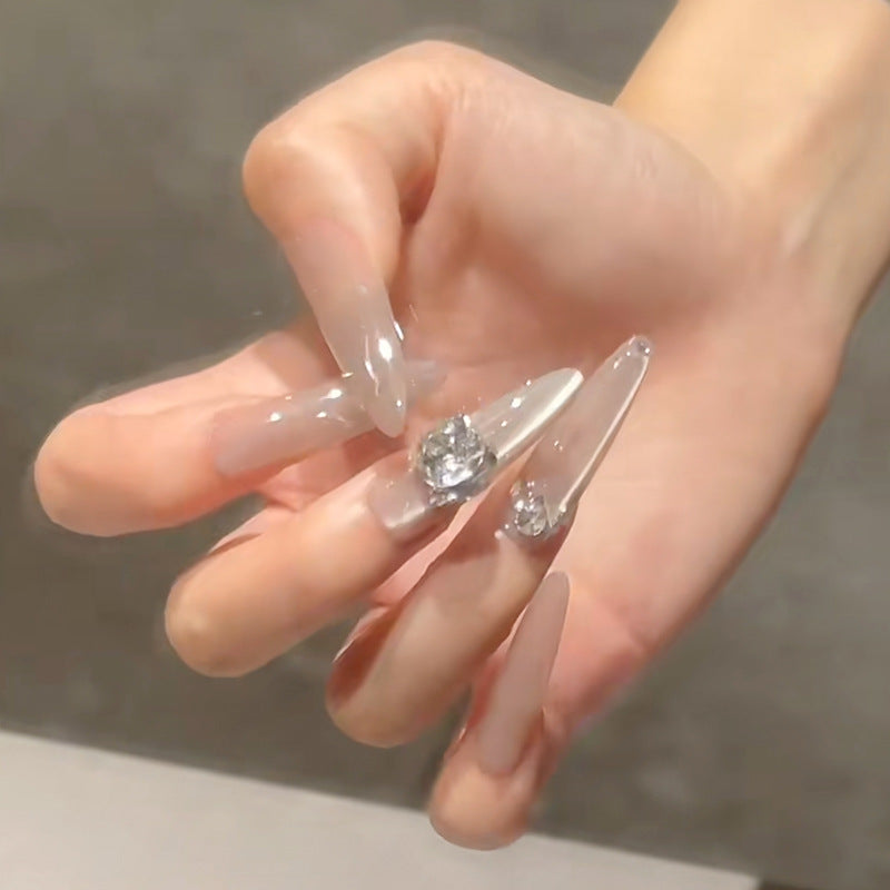 Acrylic nail set with glitter design and elegant 3D applications Kalsten