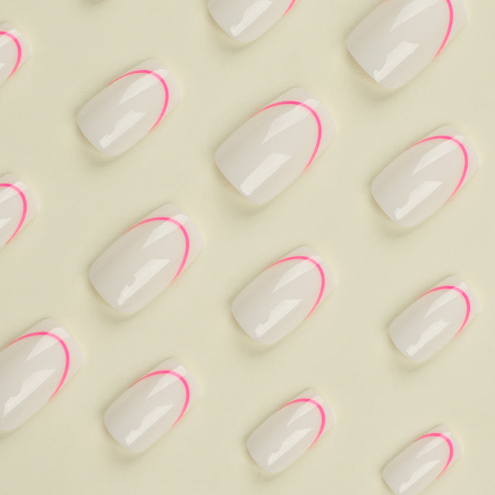 Stylish artificial nails with elegant French tip and modern accents Kalsten