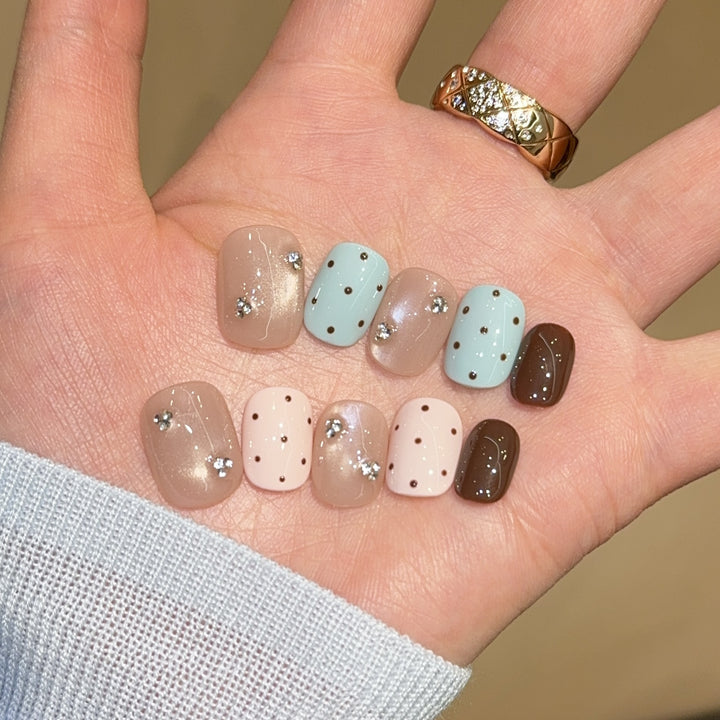 Acrylic nails with rhinestones and glitter Kalsten