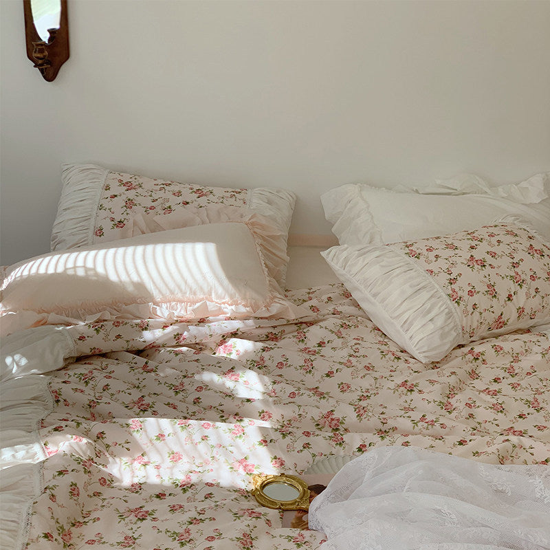 Cozy bedding set with ruffles and vintage rose pattern