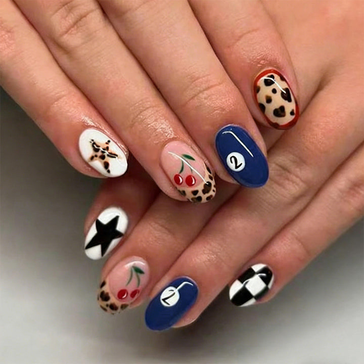 Creative nail art set with trendy animal patterns and colorful accents Kalsten