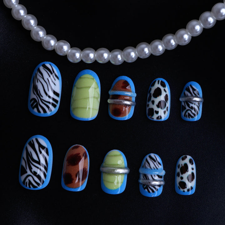 Creative art stick-on nails with modern animal motifs and colorful accents Kalsten