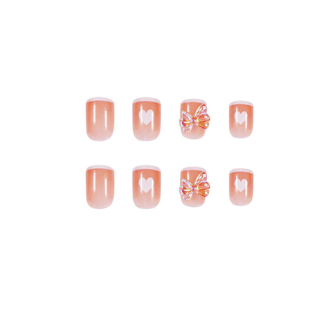 Nail art with heart and butterfly motifs Kalsten
