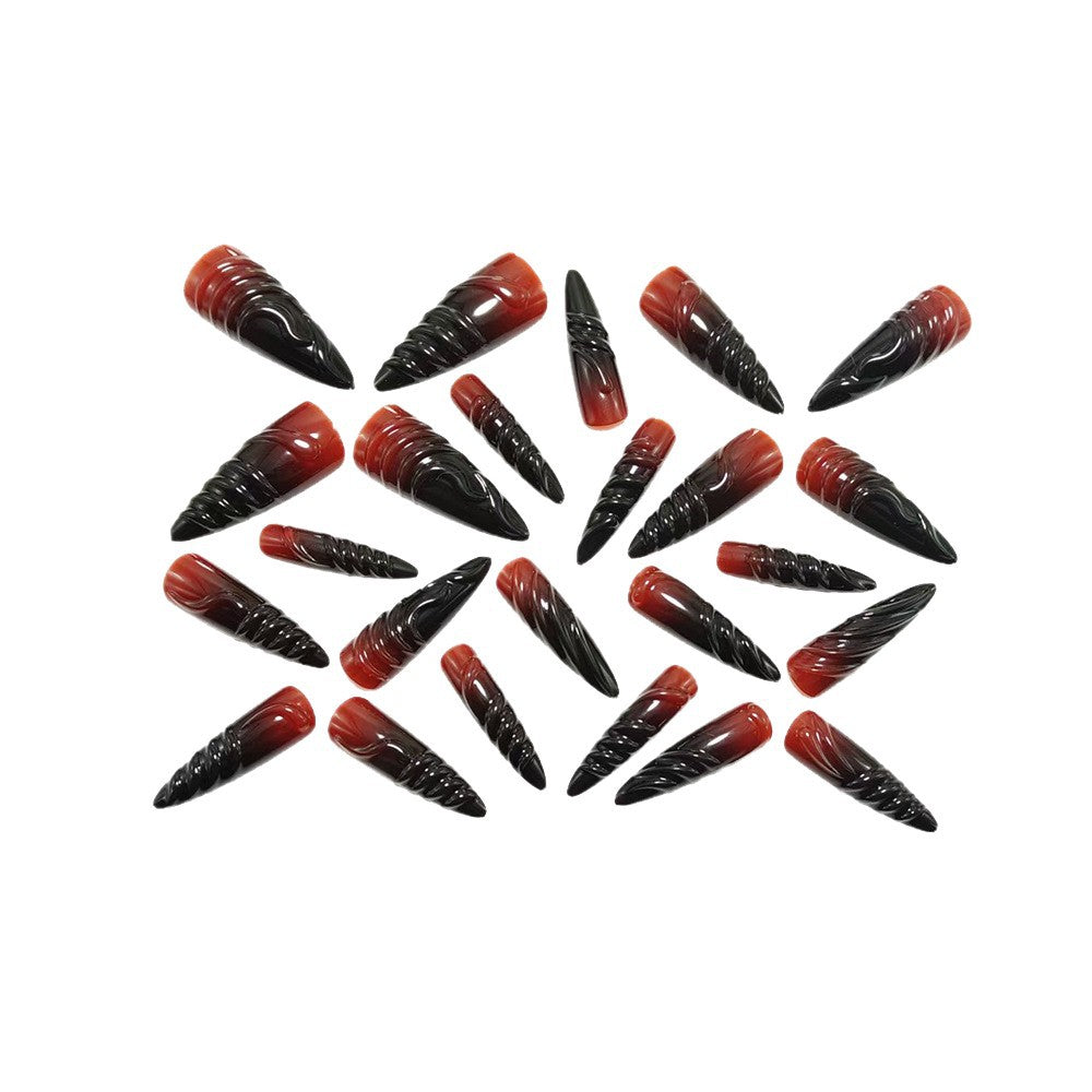 Gothic-style artificial nails with pointed tips and shiny surface Kalsten