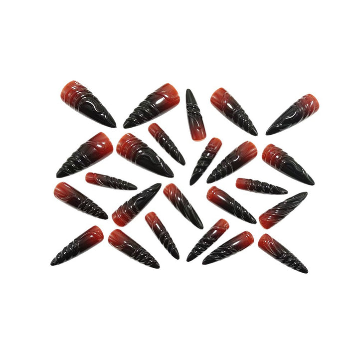 Gothic-style artificial nails with pointed tips and shiny surface Kalsten
