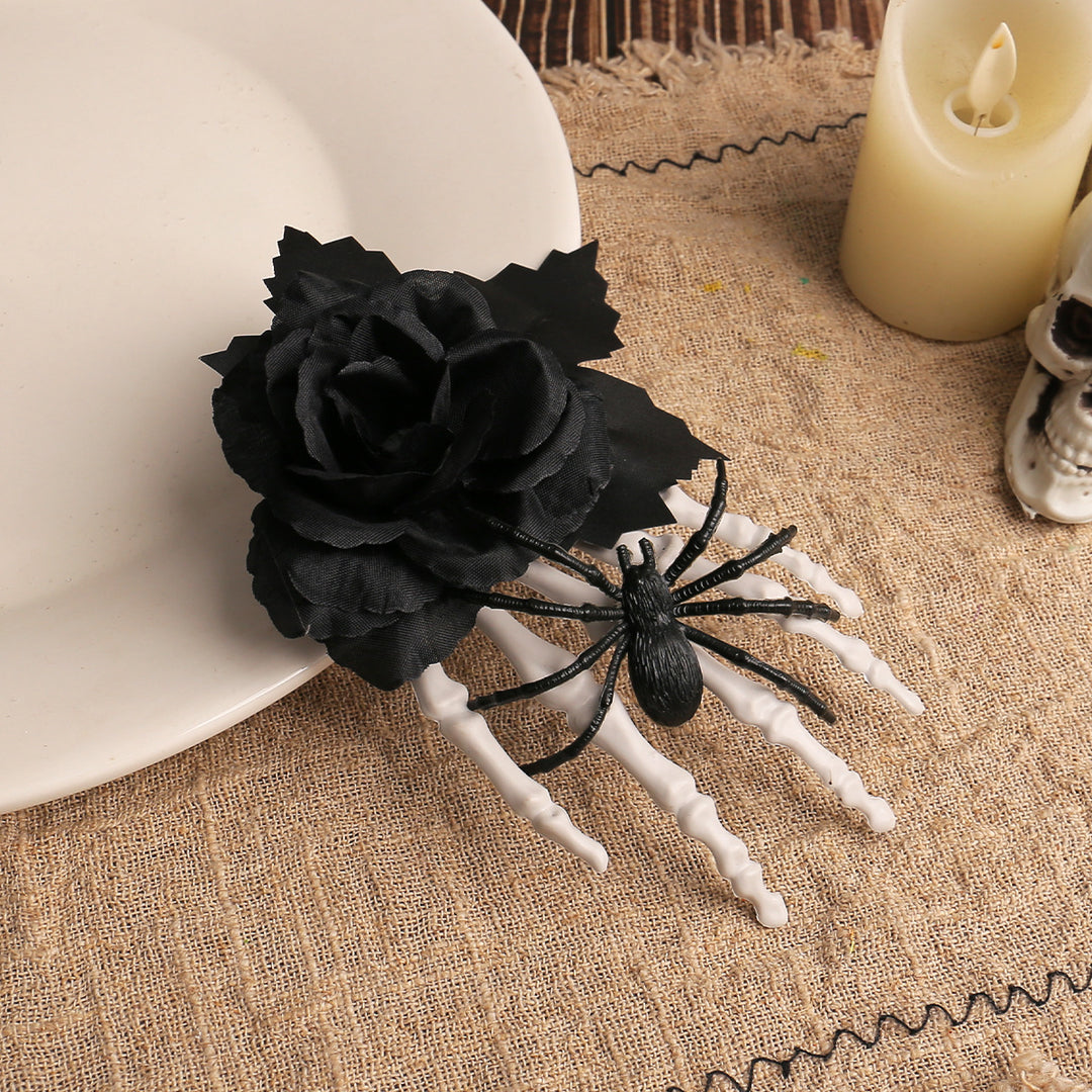 Gothic hair clip with fabric rose, skeleton fingers, and spider appliqué