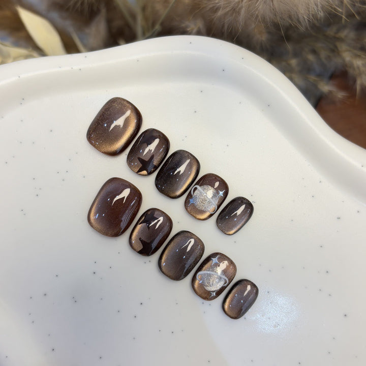 Artificial nail set with star and planet design Kalsten