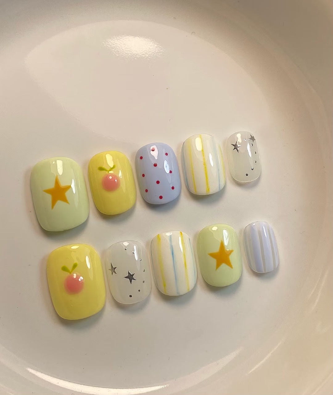 Artistic Nail Art Set with Whimsical Designs