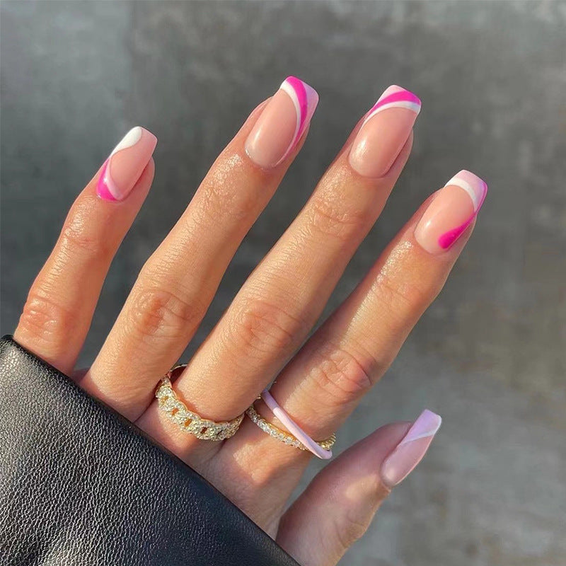 Acrylic nail extensions with elegant gradient and curved accents Kalsten