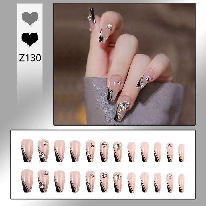 Nail art set with elegant wave patterns and delicate pearl accents Kalsten