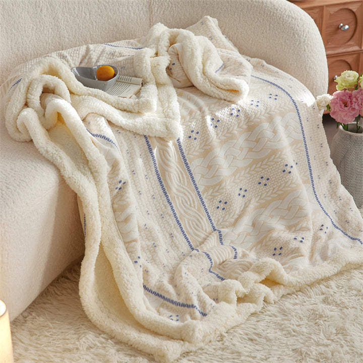 Cozy throw blanket with Sherpa lining and jacquard pattern