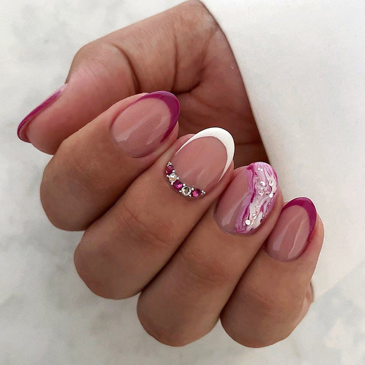 Elegant artificial nails with glamorous gradient colors and rhinestone accents Kalsten