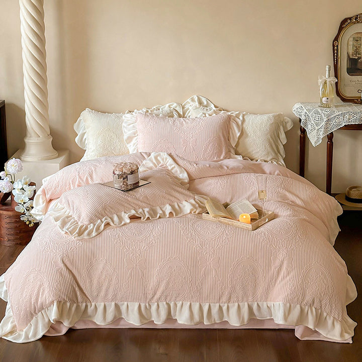Ruffled quilted bedding set with jacquard medallion and ruffle