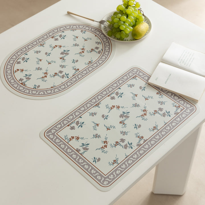 Wipeable table mats made of PU leather with botanical silhouette design Kalsten