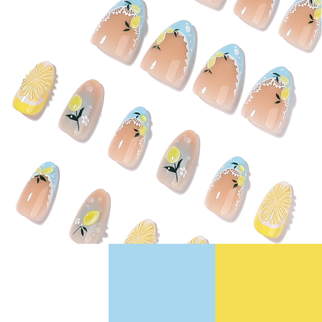 Artificial nail art with lemon and flower motifs Kalsten