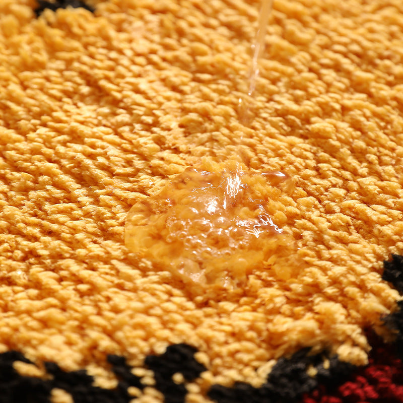 Cat-shaped doormat with tufted chenille surface and non-slip underside Kalsten