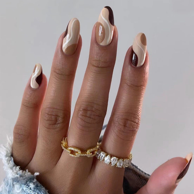 Artificial nail extensions in elegant wave design Kalsten